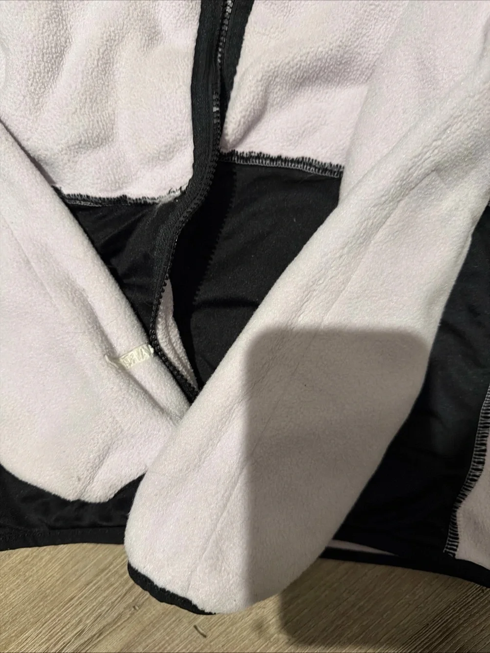 The North Face Kids Light Pink and Black Fleece Jacket